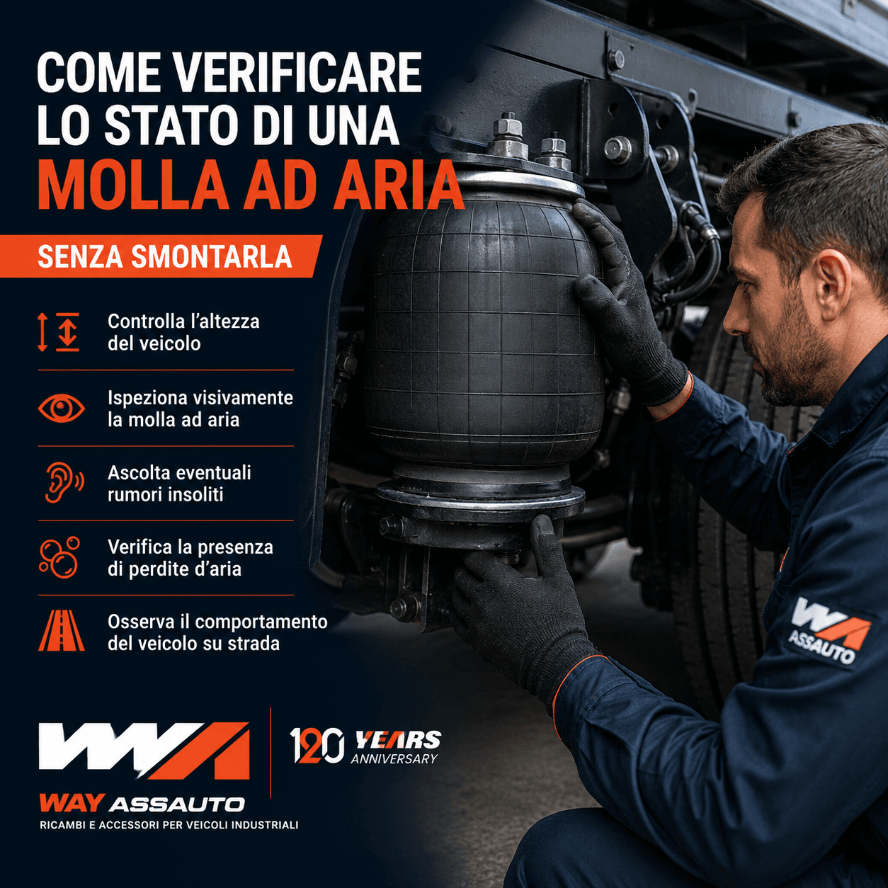 Tecnico controlla una molla ad aria della sospensione di un camion senza smontarla